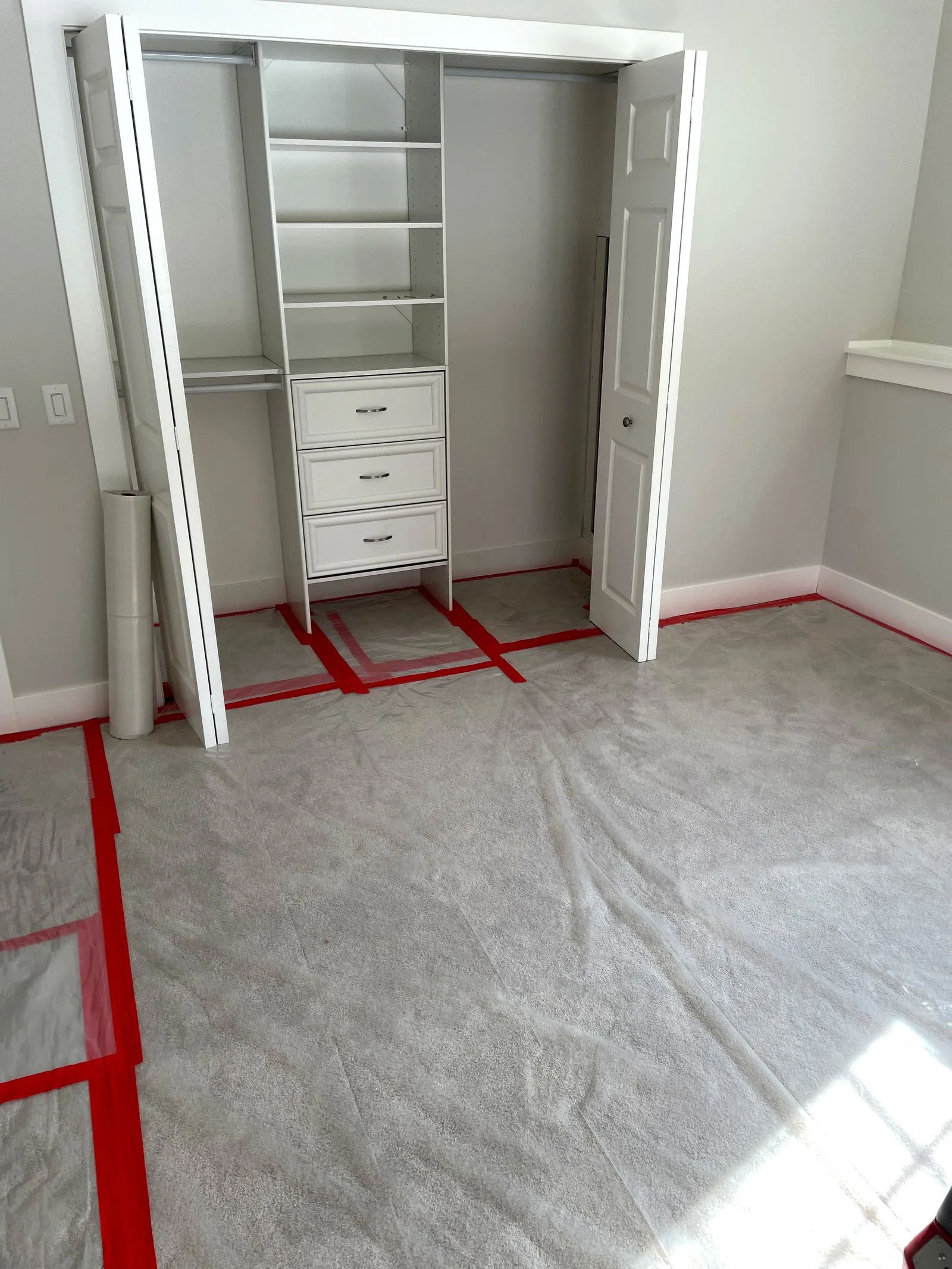 Bedroom containment setup during water damage restoration — West Michigan